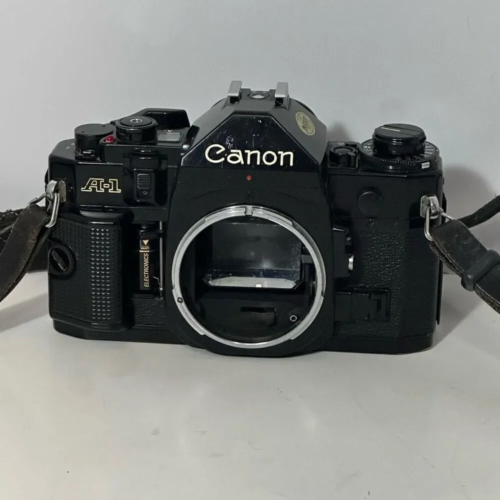 Vintage Canon A-1 Black 35 mm SLR with Strap/ Body Only